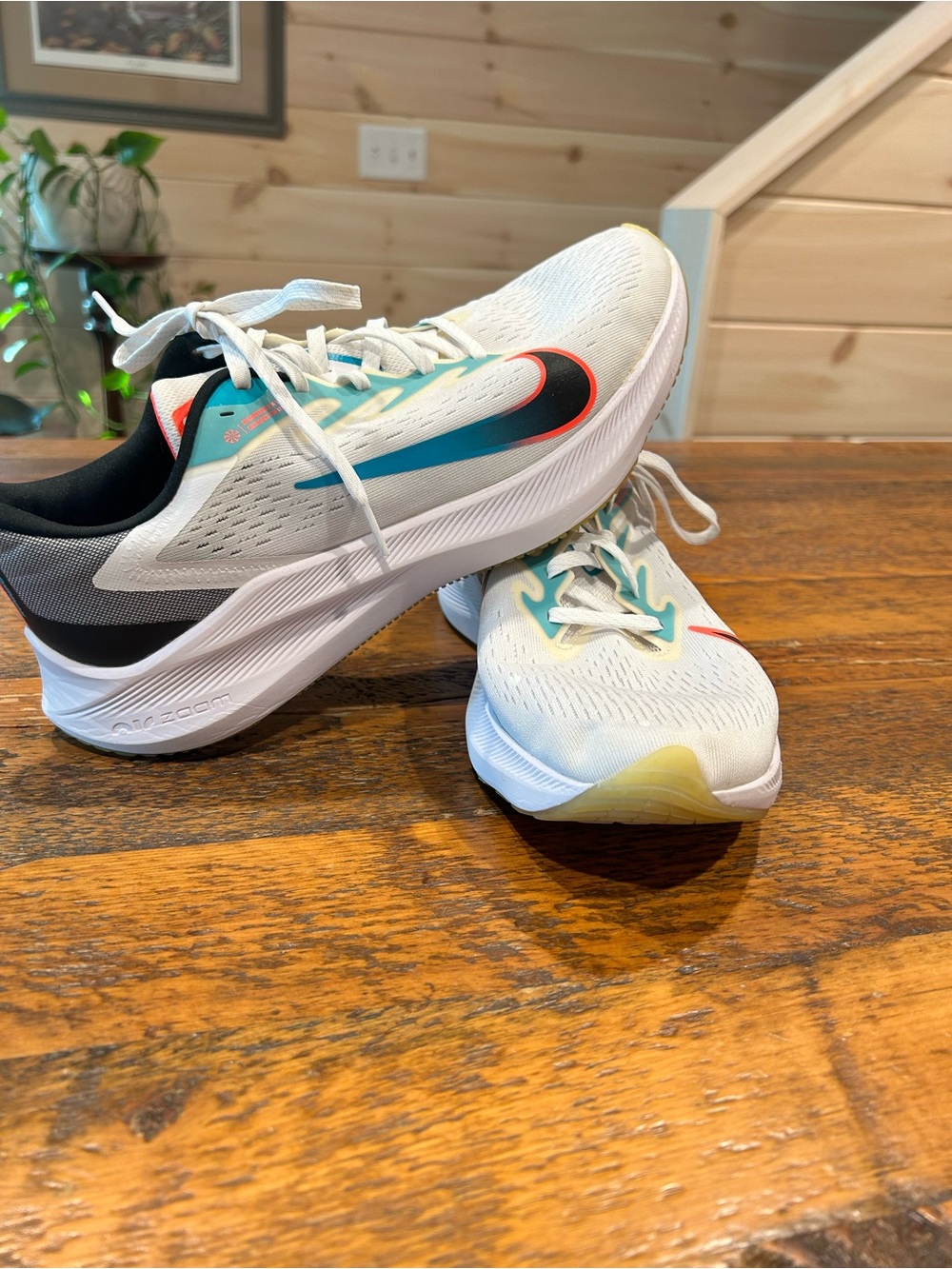 Nike Zoom Winflo 7 Men’s White Running Shoes with Teal, Black & Red Accents